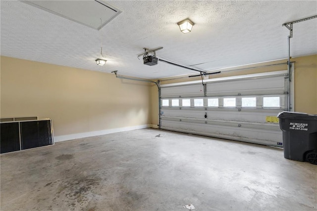 garage featuring a garage door opener