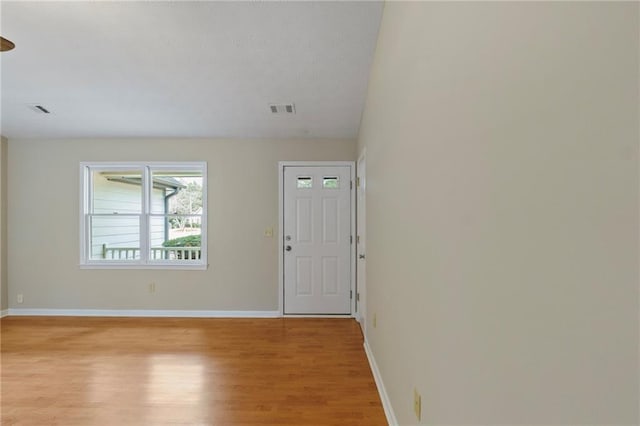 foyer with light hardwood / wood-style flooring