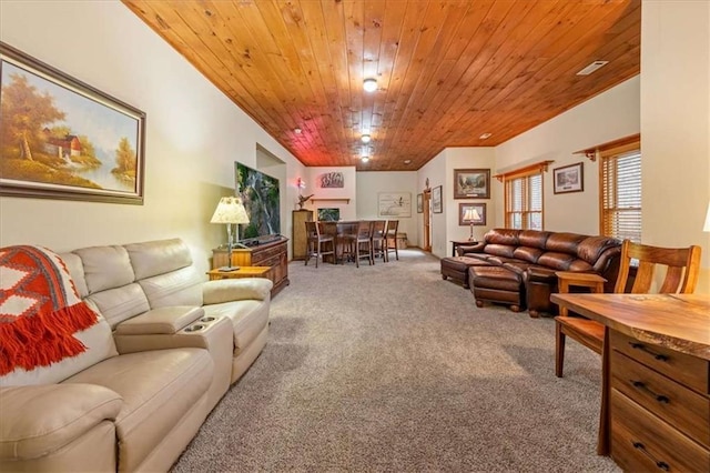 living room with carpet floors and wooden ceiling