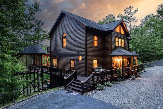 view of front of property featuring a gazebo and a deck