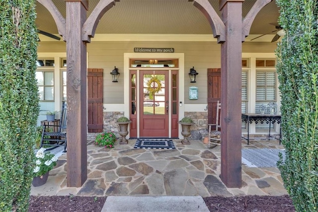 doorway to property with a porch