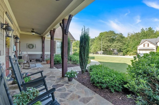 view of patio featuring ceiling fan