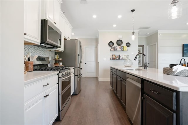 150 Azalea Xing, Dallas, GA 30132 - kitchen featuring appliances with stainless steel finishes, a sink, white cabinets, recessed lighting, and light countertops