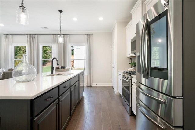 150 Azalea Xing, Dallas, GA 30132 - kitchen featuring stainless steel appliances, a sink, white cabinetry, light countertops, and baseboards
