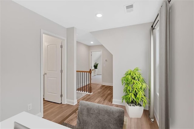 150 Azalea Xing, Dallas, GA 30132 - corridor featuring an upstairs landing, light wood finished floors, baseboards, and recessed lighting