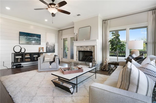 150 Azalea Xing, Dallas, GA 30132 - living room featuring a fireplace, wood finished floors, crown molding, a ceiling fan, and recessed lighting
