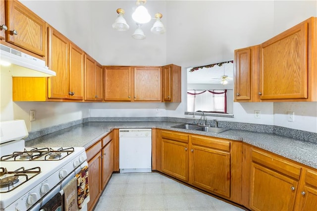 kitchen with sink and white appliances