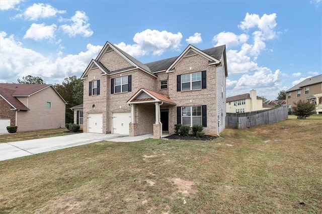 craftsman-style home with a garage and a front yard