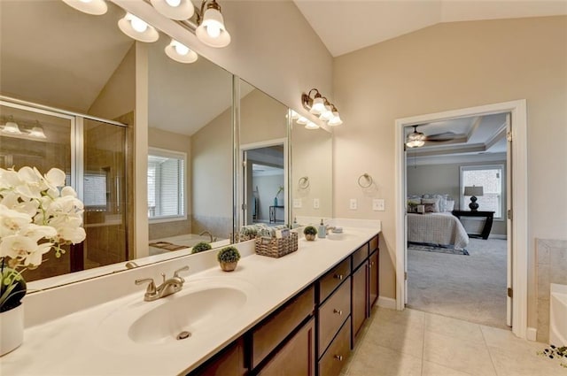 bathroom featuring tile patterned flooring, vaulted ceiling, plenty of natural light, and plus walk in shower