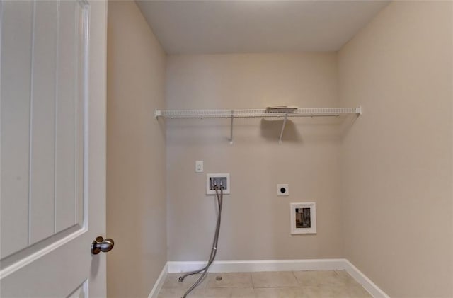 laundry area with light tile patterned floors, hookup for a washing machine, and electric dryer hookup