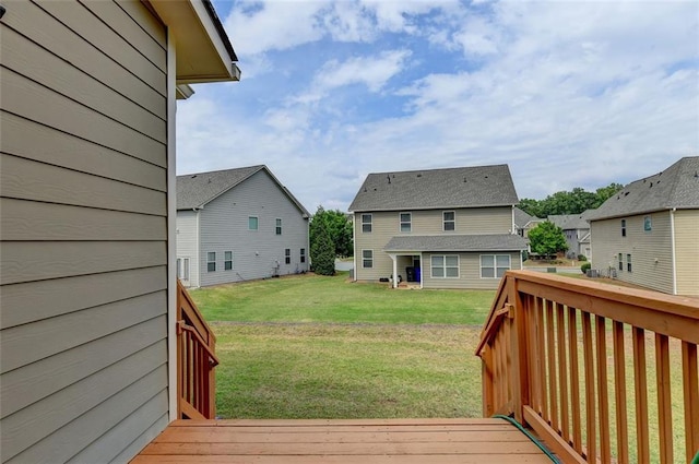 wooden deck with a yard