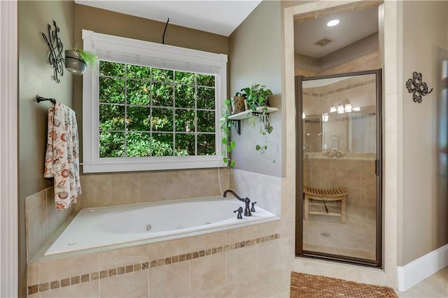 bathroom with plenty of natural light and plus walk in shower