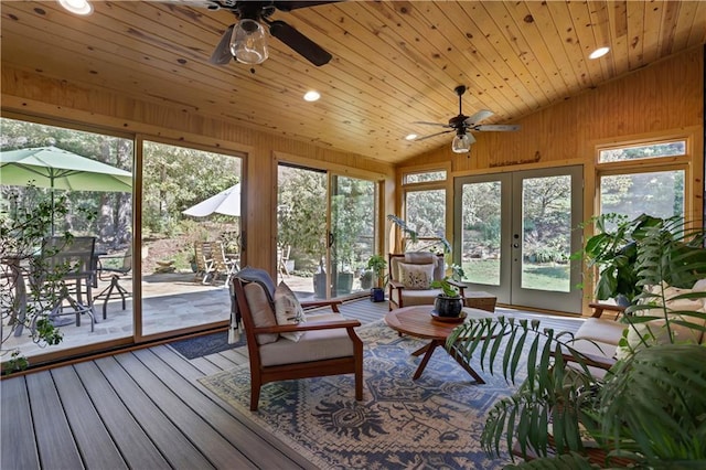 sunroom with vaulted ceiling and plenty of natural light