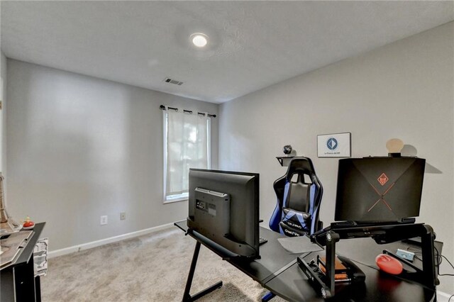 exercise room featuring carpet flooring