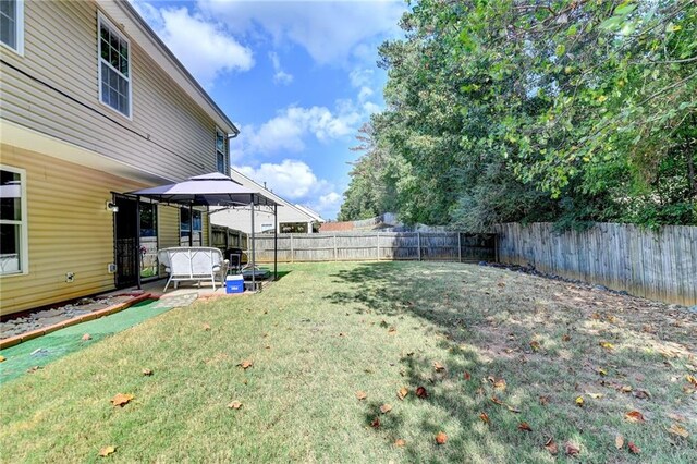 view of yard with a patio and a gazebo