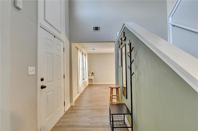 hall featuring light hardwood / wood-style floors