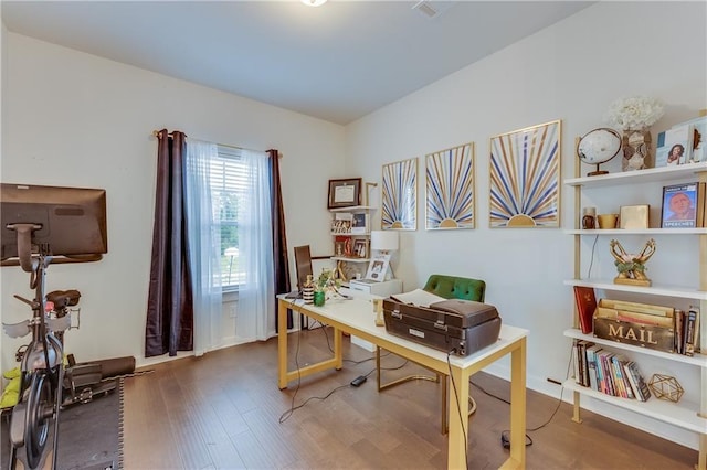 office area with wood-type flooring