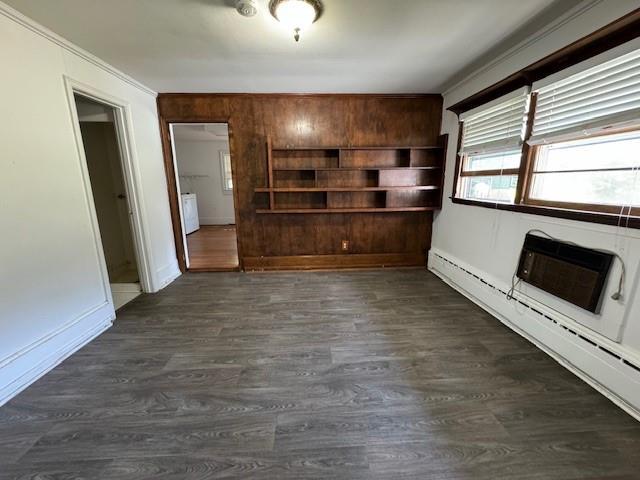 95 Jones St, Dahlonega, GA 30533 - unfurnished dining area with a baseboard radiator and dark wood finished floors