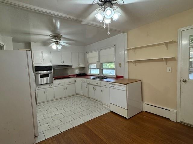 95 Jones St, Dahlonega, GA 30533 - kitchen with white appliances, baseboard heating, a ceiling fan, and dark countertops