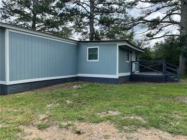 8775 Al Highway 9 Al Highway Unit 9, Cedar Bluff, AL 35959 - view of home's exterior with a lawn and a deck