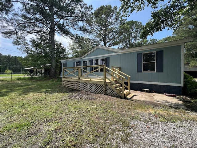 8775 Al Highway 9 Al Highway Unit 9, Cedar Bluff, AL 35959 - manufactured / mobile home featuring a wooden deck and a front yard