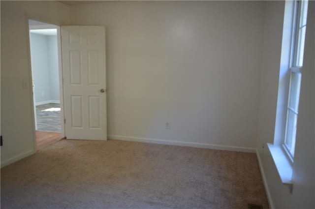 view of carpeted spare room