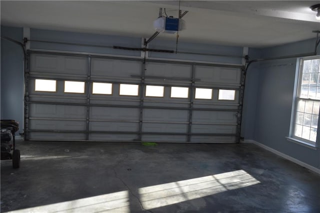 garage featuring a garage door opener