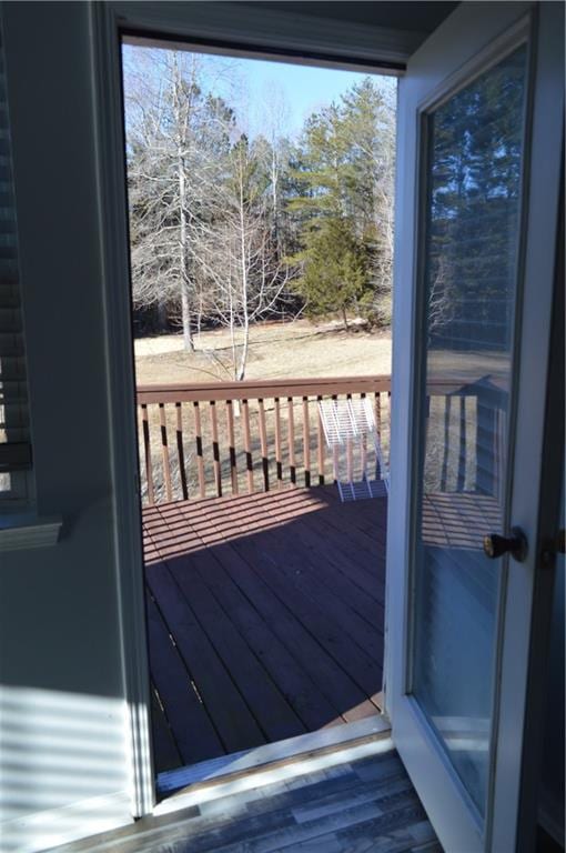 doorway to outside featuring hardwood / wood-style floors