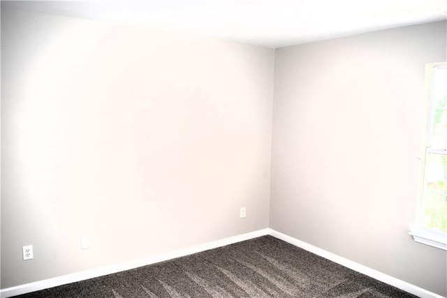 253 Woodland Way, Canton, GA 30114 - spare room with baseboards and dark carpet
