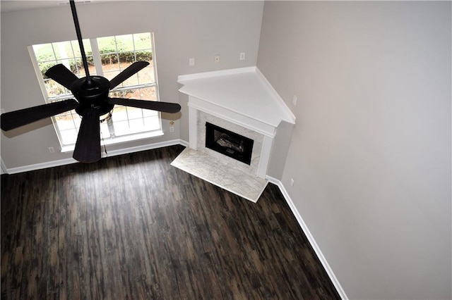 253 Woodland Way, Canton, GA 30114 - unfurnished living room with baseboards, a fireplace, and wood finished floors