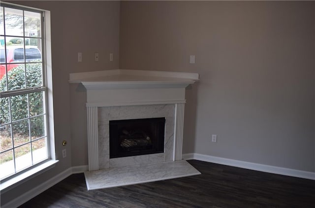 253 Woodland Way, Canton, GA 30114 - unfurnished living room with baseboards, dark wood-style floors, and a premium fireplace