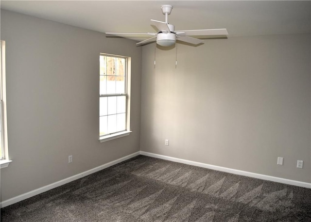253 Woodland Way, Canton, GA 30114 - unfurnished room with baseboards, ceiling fan, and dark carpet