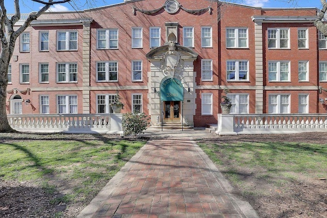 view of front of home with brick siding