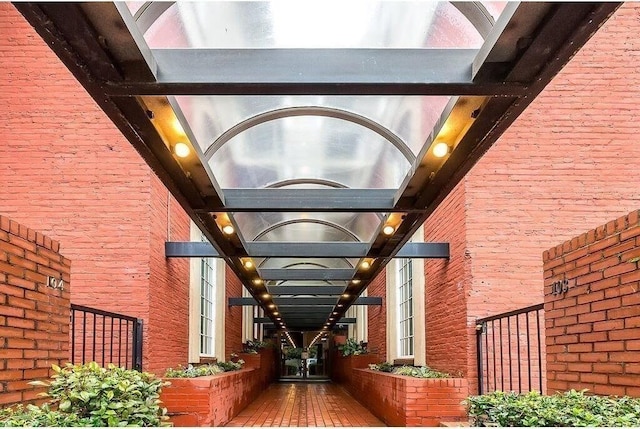 entrance to property with brick siding