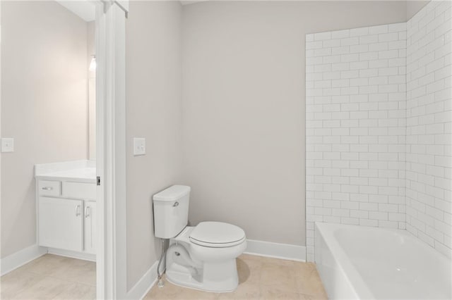 full bathroom featuring toilet, vanity, tile patterned floors, and tub / shower combination