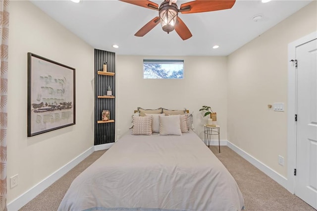 carpeted bedroom with ceiling fan