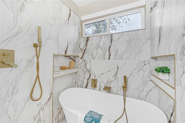 bathroom featuring a tub and tile walls