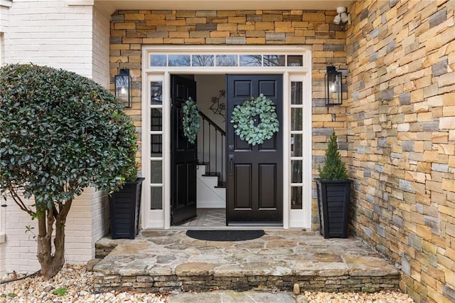 entrance to property with brick siding