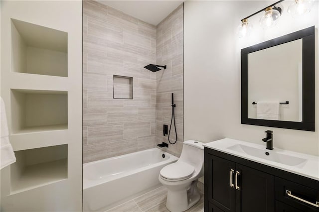 bathroom featuring shower / tub combination, vanity, and toilet