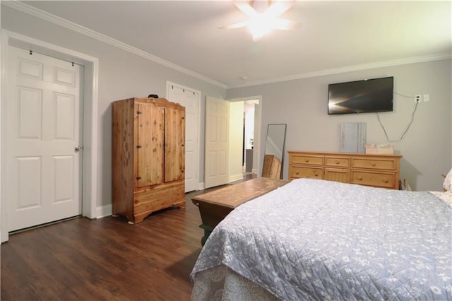 bedroom featuring crown molding, dark wood finished floors, ceiling fan, and baseboards