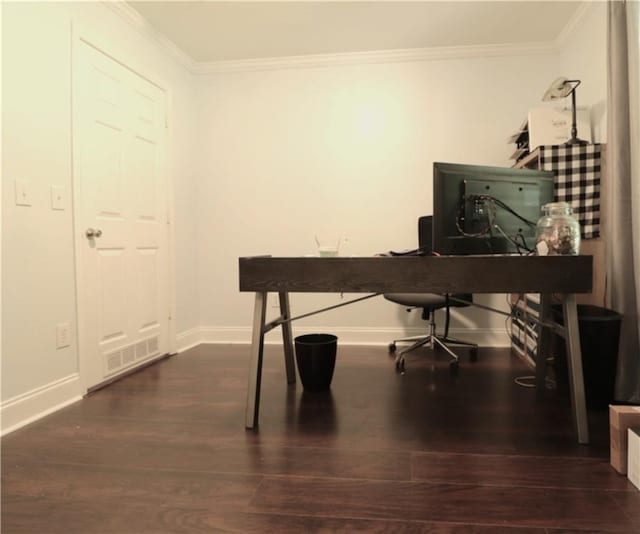 office area with baseboards, ornamental molding, dark wood-type flooring, and visible vents