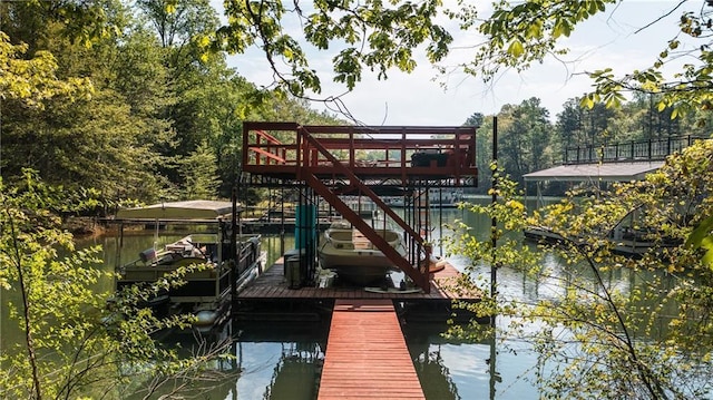view of dock with a water view