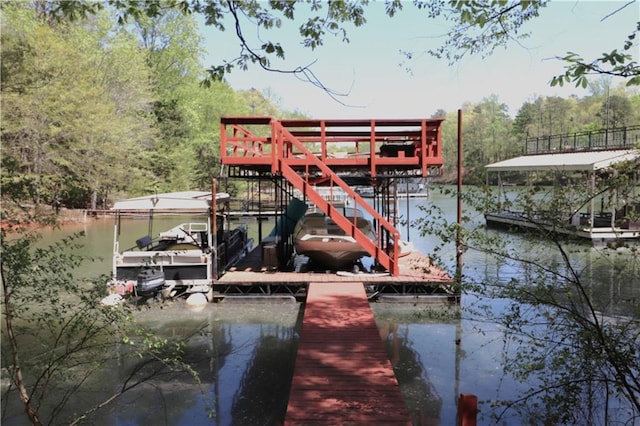 dock area featuring a water view