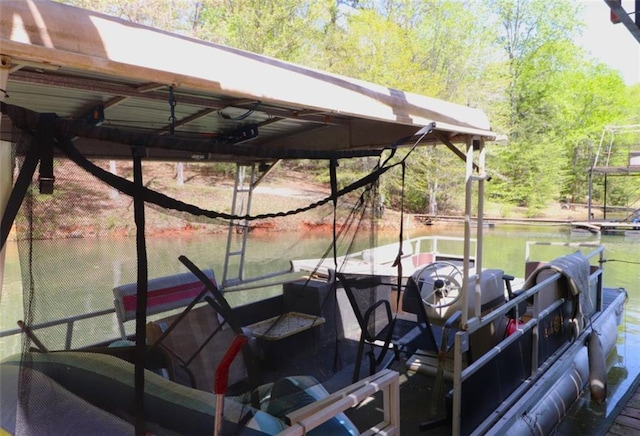dock area featuring a water view and boat lift