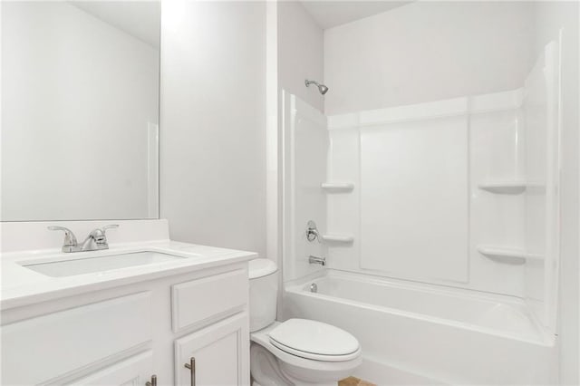 full bathroom featuring vanity, shower / washtub combination, and toilet