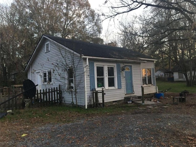 view of front of home with crawl space and entry steps