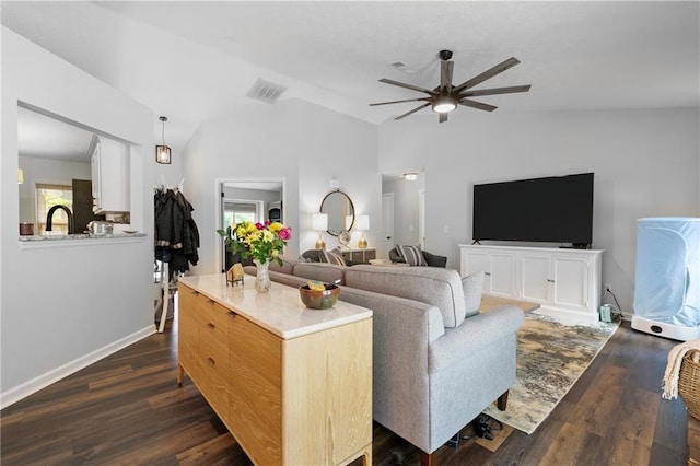 1208 Brandl Dr SW, Marietta, GA 30008 - living room featuring ceiling fan, lofted ceiling, dark wood-style flooring, and baseboards