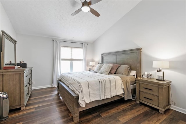 1208 Brandl Dr SW, Marietta, GA 30008 - bedroom with dark wood-style floors, a textured ceiling, lofted ceiling, baseboards, and a ceiling fan