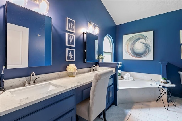 1208 Brandl Dr SW, Marietta, GA 30008 - bathroom with double vanity, vaulted ceiling, a bath, and tile patterned flooring