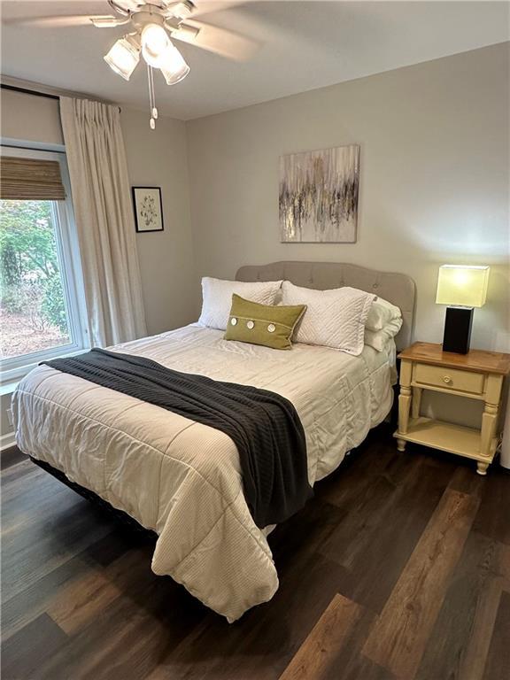1208 Brandl Dr SW, Marietta, GA 30008 - bedroom featuring wood finished floors and ceiling fan